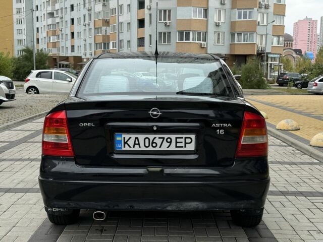 Черный Опель Астра, объемом двигателя 1.4 л и пробегом 205 тыс. км за 3900 $, фото 3 на Automoto.ua