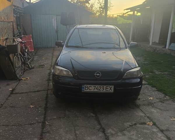 Черный Опель Астра, объемом двигателя 1.4 л и пробегом 250 тыс. км за 1800 $, фото 1 на Automoto.ua