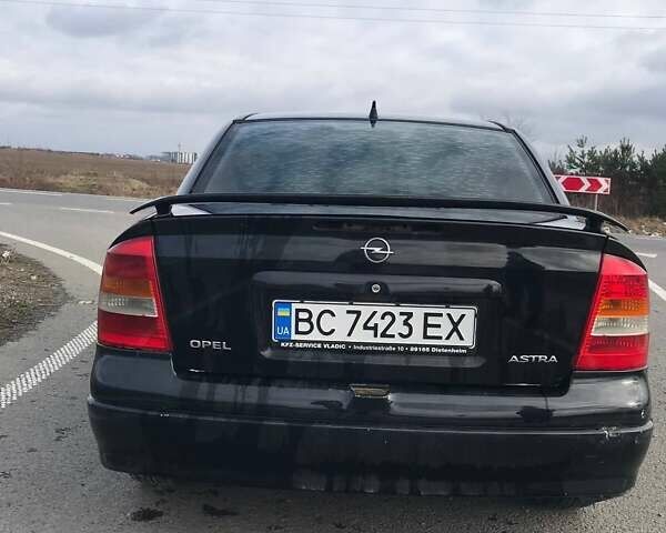 Черный Опель Астра, объемом двигателя 1.39 л и пробегом 265 тыс. км за 2100 $, фото 6 на Automoto.ua