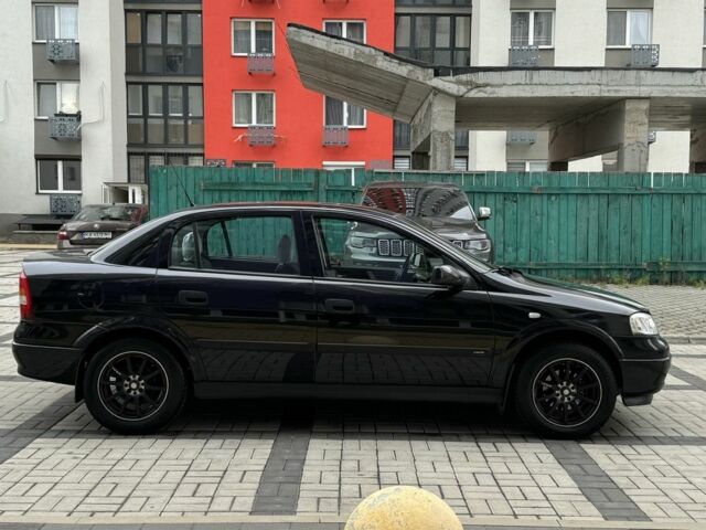 Черный Опель Астра, объемом двигателя 1.4 л и пробегом 205 тыс. км за 3900 $, фото 5 на Automoto.ua
