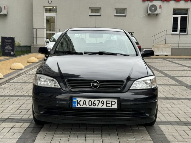 Черный Опель Астра, объемом двигателя 1.4 л и пробегом 205 тыс. км за 3900 $, фото 8 на Automoto.ua