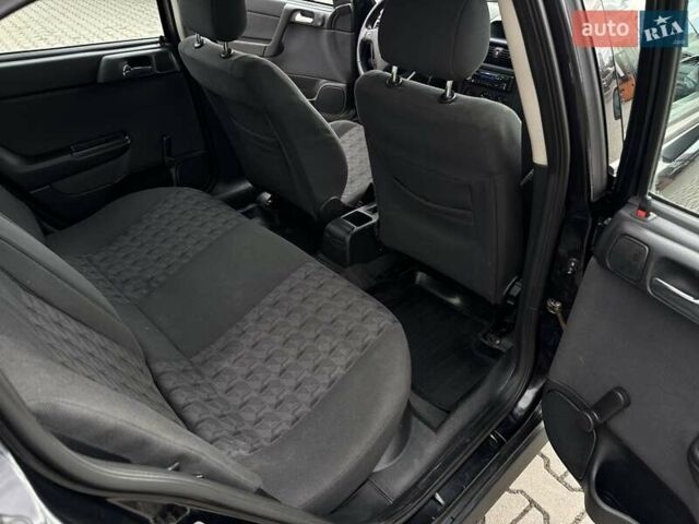 Черный Опель Астра, объемом двигателя 1.4 л и пробегом 205 тыс. км за 3800 $, фото 20 на Automoto.ua