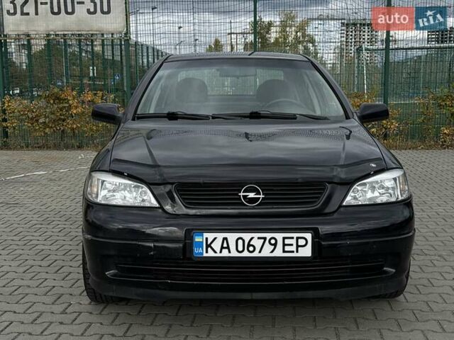 Черный Опель Астра, объемом двигателя 1.4 л и пробегом 205 тыс. км за 3800 $, фото 7 на Automoto.ua
