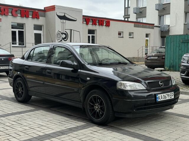 Черный Опель Астра, объемом двигателя 1.4 л и пробегом 205 тыс. км за 3900 $, фото 6 на Automoto.ua