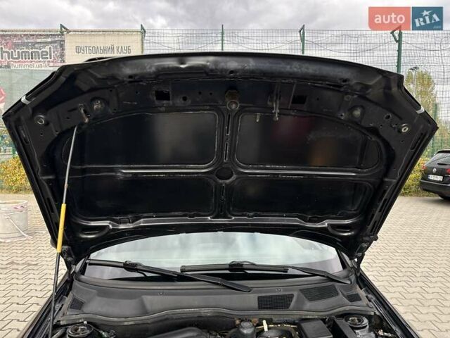 Черный Опель Астра, объемом двигателя 1.4 л и пробегом 205 тыс. км за 3800 $, фото 26 на Automoto.ua