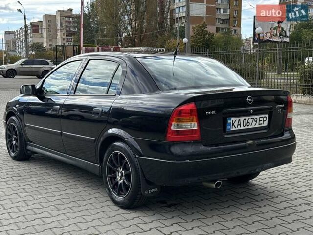 Черный Опель Астра, объемом двигателя 1.4 л и пробегом 205 тыс. км за 3800 $, фото 2 на Automoto.ua