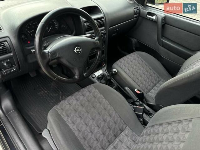 Черный Опель Астра, объемом двигателя 1.4 л и пробегом 205 тыс. км за 3800 $, фото 14 на Automoto.ua