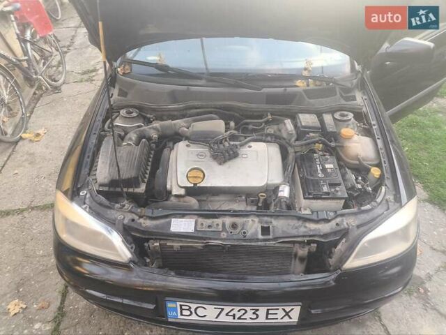 Черный Опель Астра, объемом двигателя 1.4 л и пробегом 250 тыс. км за 1800 $, фото 4 на Automoto.ua