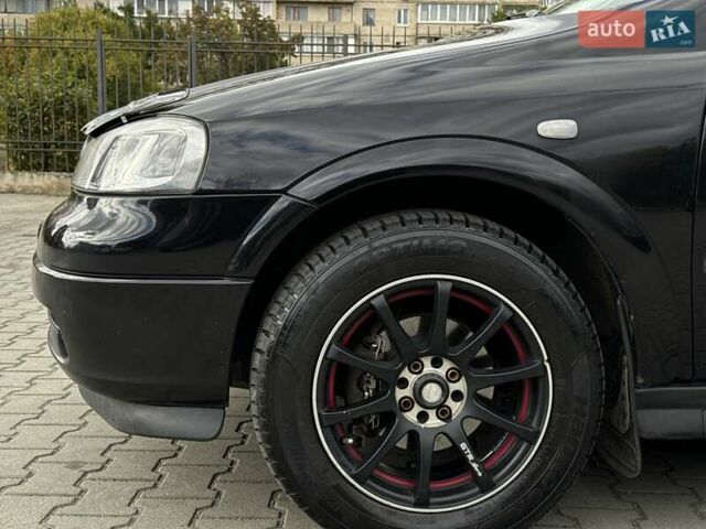 Черный Опель Астра, объемом двигателя 1.4 л и пробегом 205 тыс. км за 3800 $, фото 8 на Automoto.ua