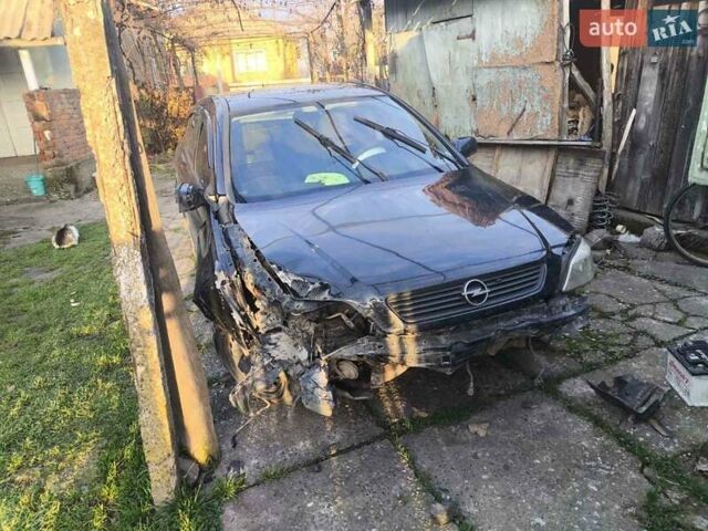 Черный Опель Астра, объемом двигателя 1.4 л и пробегом 200 тыс. км за 800 $, фото 6 на Automoto.ua