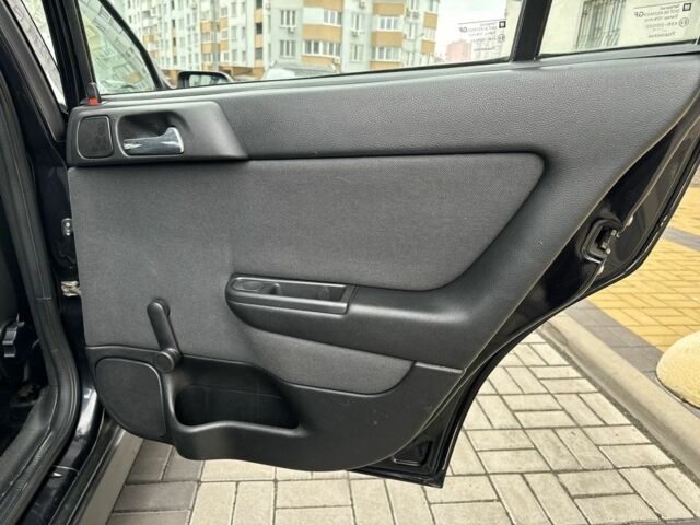 Черный Опель Астра, объемом двигателя 1.4 л и пробегом 205 тыс. км за 3900 $, фото 21 на Automoto.ua