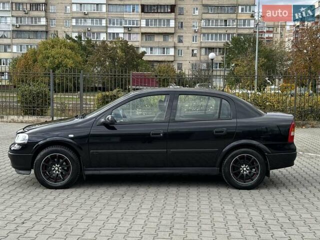 Черный Опель Астра, объемом двигателя 1.4 л и пробегом 205 тыс. км за 3800 $, фото 1 на Automoto.ua
