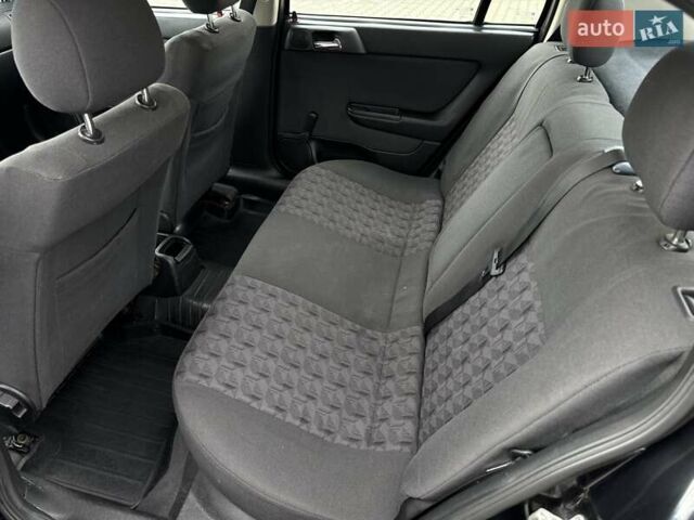 Черный Опель Астра, объемом двигателя 1.4 л и пробегом 205 тыс. км за 3800 $, фото 16 на Automoto.ua