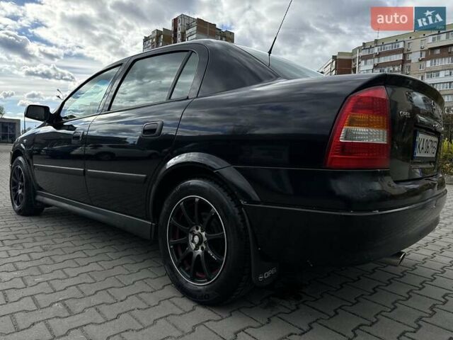 Черный Опель Астра, объемом двигателя 1.4 л и пробегом 205 тыс. км за 3800 $, фото 11 на Automoto.ua