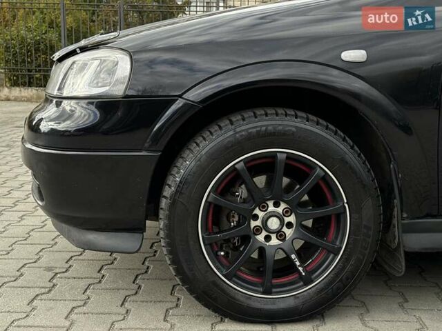 Черный Опель Астра, объемом двигателя 1.4 л и пробегом 205 тыс. км за 3800 $, фото 9 на Automoto.ua
