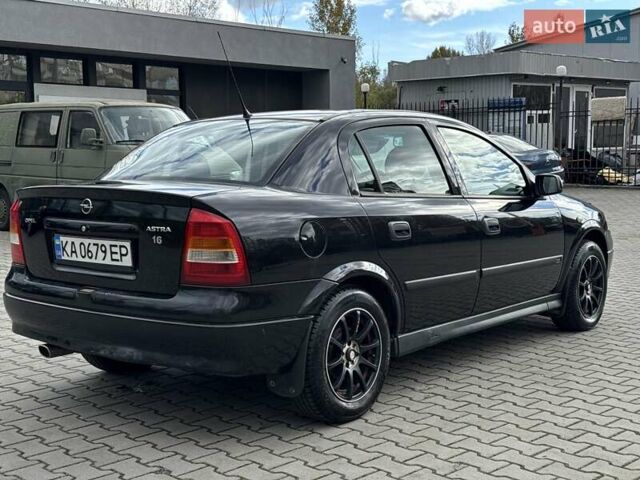 Черный Опель Астра, объемом двигателя 1.4 л и пробегом 205 тыс. км за 3800 $, фото 4 на Automoto.ua