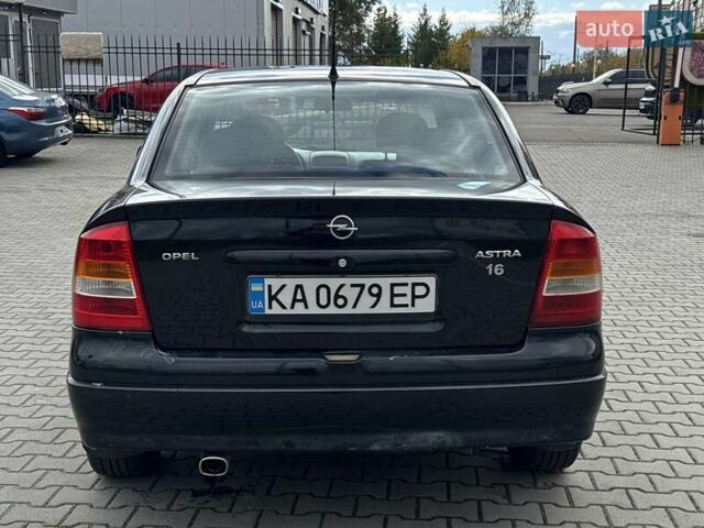 Черный Опель Астра, объемом двигателя 1.4 л и пробегом 205 тыс. км за 3800 $, фото 3 на Automoto.ua