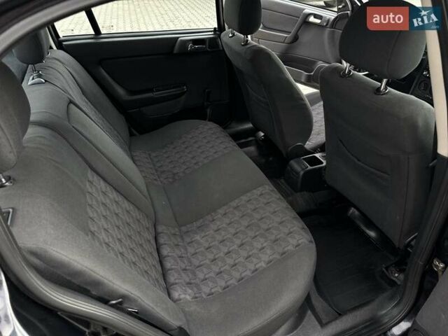 Черный Опель Астра, объемом двигателя 1.4 л и пробегом 205 тыс. км за 3800 $, фото 19 на Automoto.ua