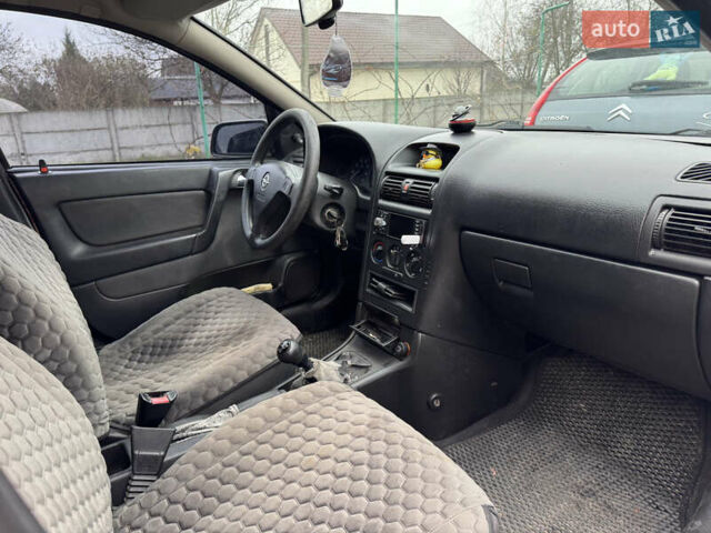 Черный Опель Астра, объемом двигателя 1.4 л и пробегом 208 тыс. км за 4500 $, фото 8 на Automoto.ua