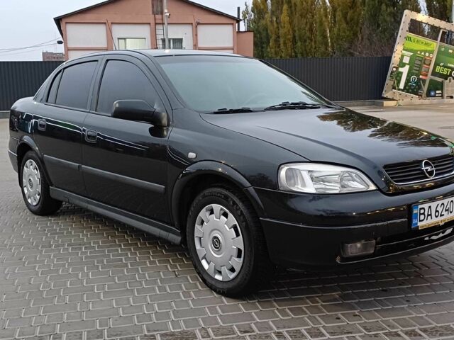 Черный Опель Астра, объемом двигателя 1.4 л и пробегом 166 тыс. км за 4700 $, фото 2 на Automoto.ua