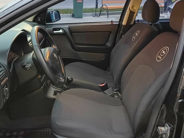 Черный Опель Астра, объемом двигателя 1.4 л и пробегом 166 тыс. км за 4700 $, фото 7 на Automoto.ua