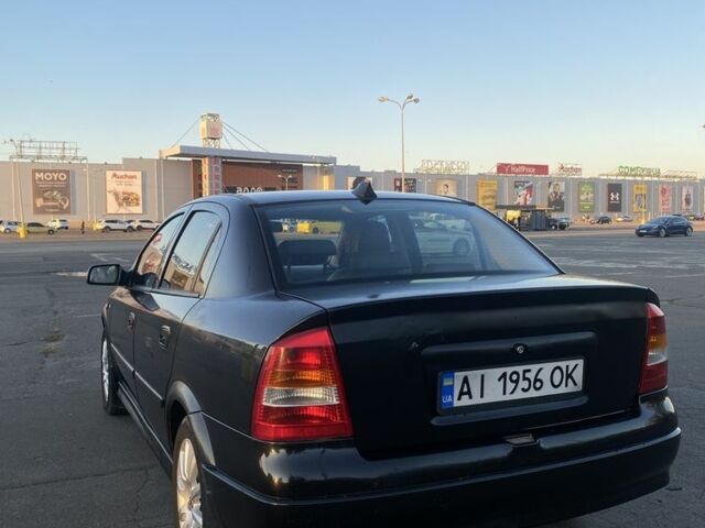 Черный Опель Астра, объемом двигателя 1.4 л и пробегом 300 тыс. км за 2800 $, фото 3 на Automoto.ua