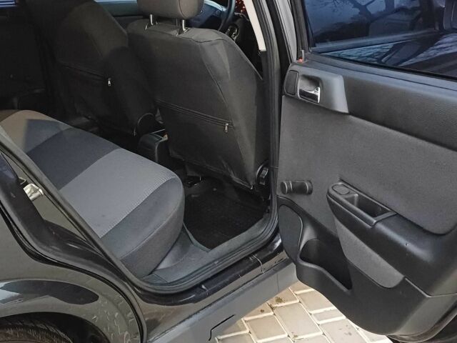 Черный Опель Астра, объемом двигателя 1.4 л и пробегом 166 тыс. км за 4700 $, фото 10 на Automoto.ua