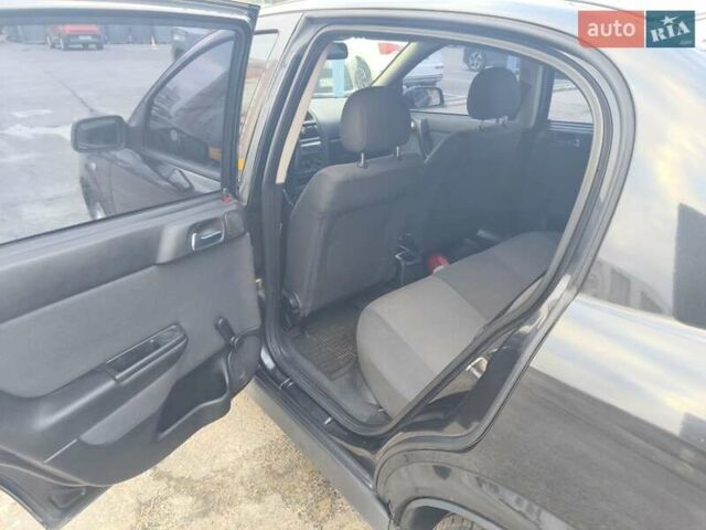 Черный Опель Астра, объемом двигателя 1.4 л и пробегом 217 тыс. км за 2900 $, фото 6 на Automoto.ua
