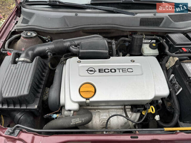 Черный Опель Астра, объемом двигателя 1.4 л и пробегом 208 тыс. км за 4500 $, фото 14 на Automoto.ua