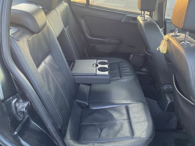 Черный Опель Астра, объемом двигателя 1.4 л и пробегом 300 тыс. км за 2800 $, фото 5 на Automoto.ua