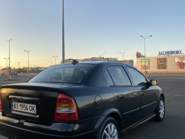 Черный Опель Астра, объемом двигателя 1.4 л и пробегом 300 тыс. км за 2800 $, фото 2 на Automoto.ua