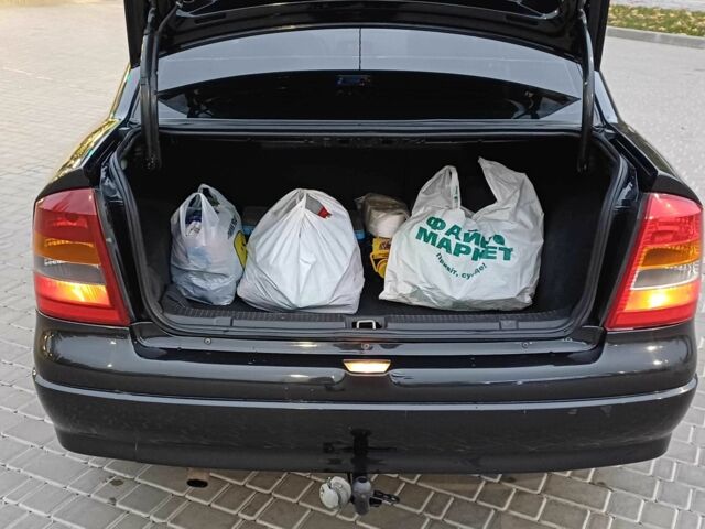 Черный Опель Астра, объемом двигателя 1.4 л и пробегом 166 тыс. км за 4700 $, фото 19 на Automoto.ua