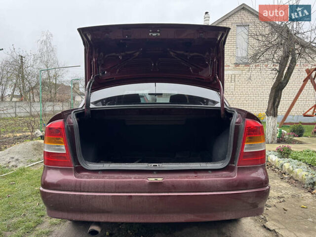 Черный Опель Астра, объемом двигателя 1.4 л и пробегом 208 тыс. км за 4500 $, фото 12 на Automoto.ua