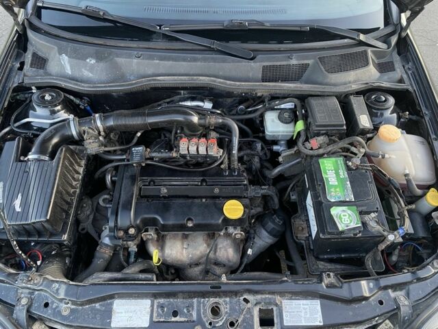 Черный Опель Астра, объемом двигателя 1.4 л и пробегом 300 тыс. км за 2800 $, фото 7 на Automoto.ua