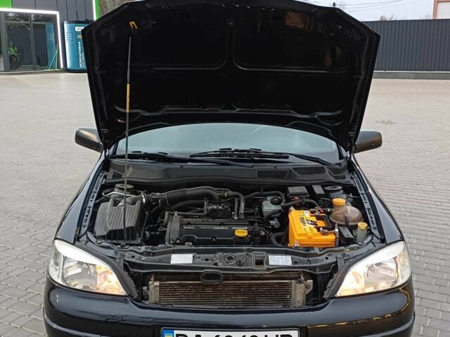 Черный Опель Астра, объемом двигателя 1.4 л и пробегом 166 тыс. км за 4700 $, фото 18 на Automoto.ua