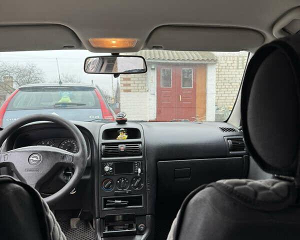 Черный Опель Астра, объемом двигателя 1.4 л и пробегом 208 тыс. км за 4500 $, фото 11 на Automoto.ua