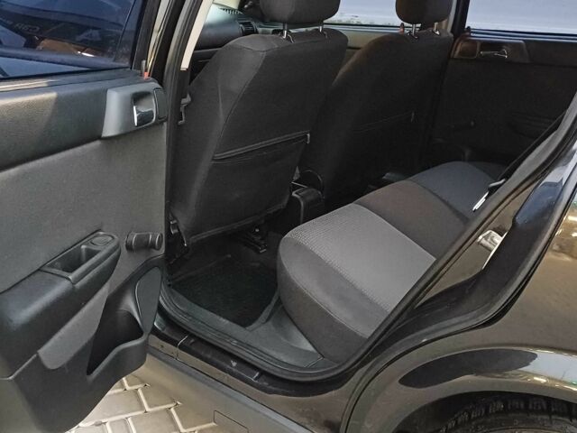 Черный Опель Астра, объемом двигателя 1.4 л и пробегом 166 тыс. км за 4700 $, фото 8 на Automoto.ua