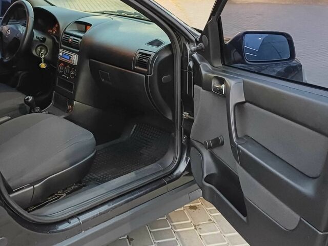 Черный Опель Астра, объемом двигателя 1.4 л и пробегом 166 тыс. км за 4700 $, фото 11 на Automoto.ua