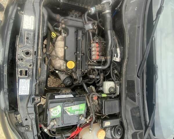 Черный Опель Астра, объемом двигателя 1.4 л и пробегом 349 тыс. км за 3650 $, фото 8 на Automoto.ua