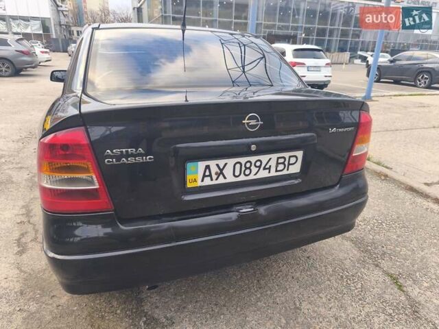 Черный Опель Астра, объемом двигателя 1.4 л и пробегом 217 тыс. км за 2900 $, фото 8 на Automoto.ua