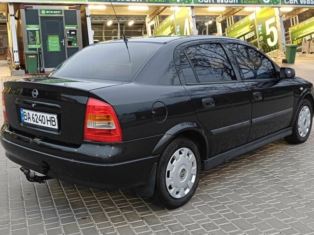 Черный Опель Астра, объемом двигателя 1.4 л и пробегом 166 тыс. км за 4700 $, фото 3 на Automoto.ua