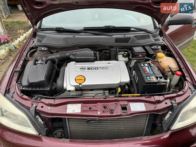 Черный Опель Астра, объемом двигателя 1.4 л и пробегом 208 тыс. км за 4500 $, фото 13 на Automoto.ua