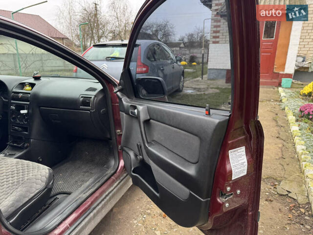 Черный Опель Астра, объемом двигателя 1.4 л и пробегом 208 тыс. км за 4500 $, фото 7 на Automoto.ua