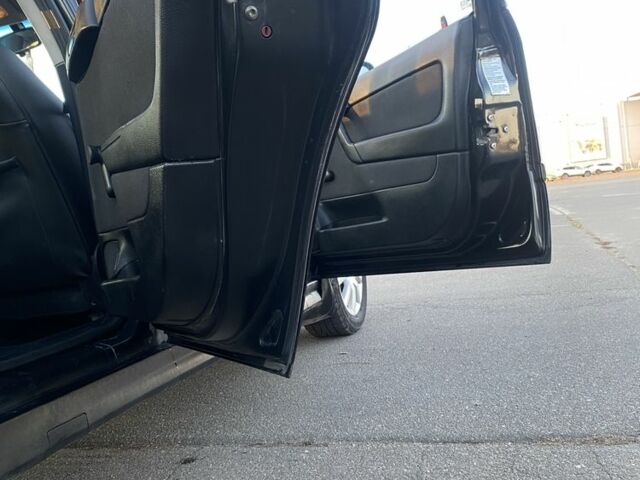 Черный Опель Астра, объемом двигателя 1.4 л и пробегом 300 тыс. км за 2800 $, фото 4 на Automoto.ua