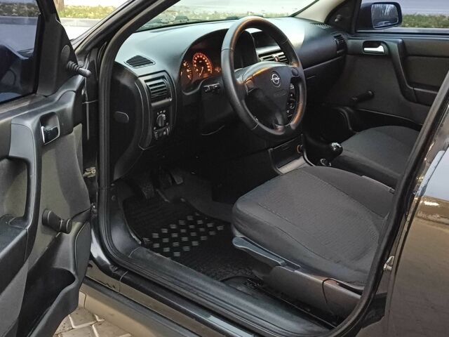 Черный Опель Астра, объемом двигателя 1.4 л и пробегом 166 тыс. км за 4700 $, фото 6 на Automoto.ua