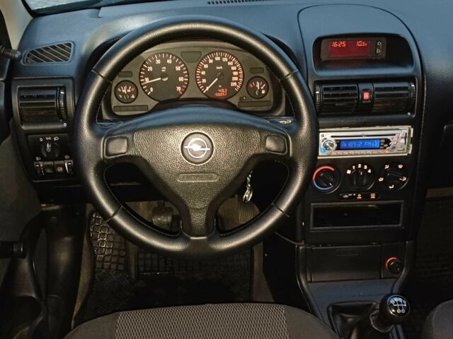 Черный Опель Астра, объемом двигателя 1.4 л и пробегом 166 тыс. км за 4700 $, фото 13 на Automoto.ua