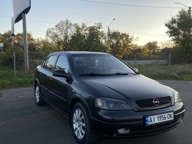 Черный Опель Астра, объемом двигателя 1.4 л и пробегом 300 тыс. км за 2800 $, фото 1 на Automoto.ua