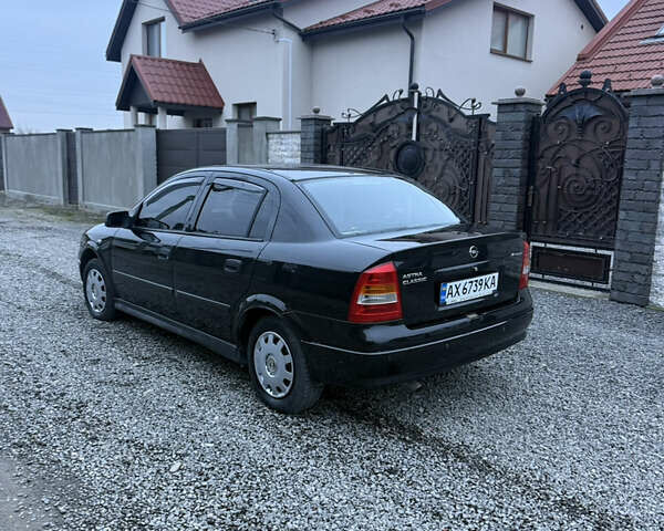Черный Опель Астра, объемом двигателя 1.36 л и пробегом 260 тыс. км за 2900 $, фото 2 на Automoto.ua