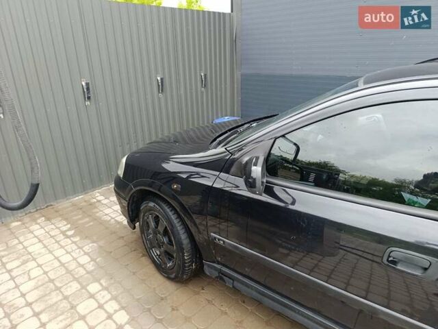 Черный Опель Астра, объемом двигателя 1.6 л и пробегом 147 тыс. км за 2700 $, фото 9 на Automoto.ua