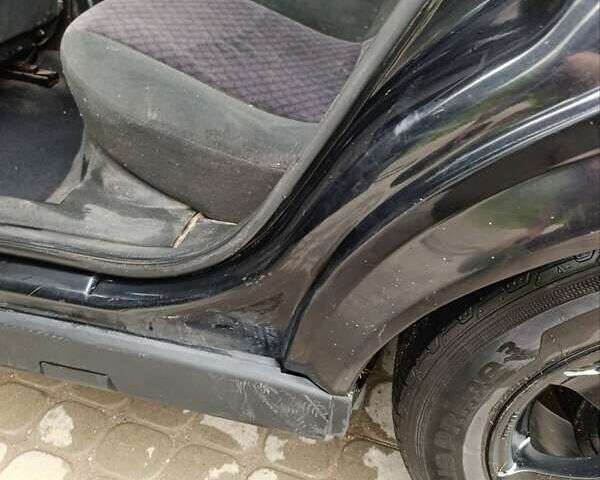 Черный Опель Астра, объемом двигателя 1.6 л и пробегом 147 тыс. км за 2700 $, фото 10 на Automoto.ua